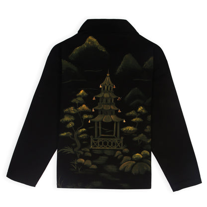 A black Beck Unisex Hand-Painted Jacket seen from the front. The alt texts say, "Unisex 
black cotton denim twill jacket with hand-painted artwork" and "Beck hand-painted 
jacket in black, featuring unique artwork." 