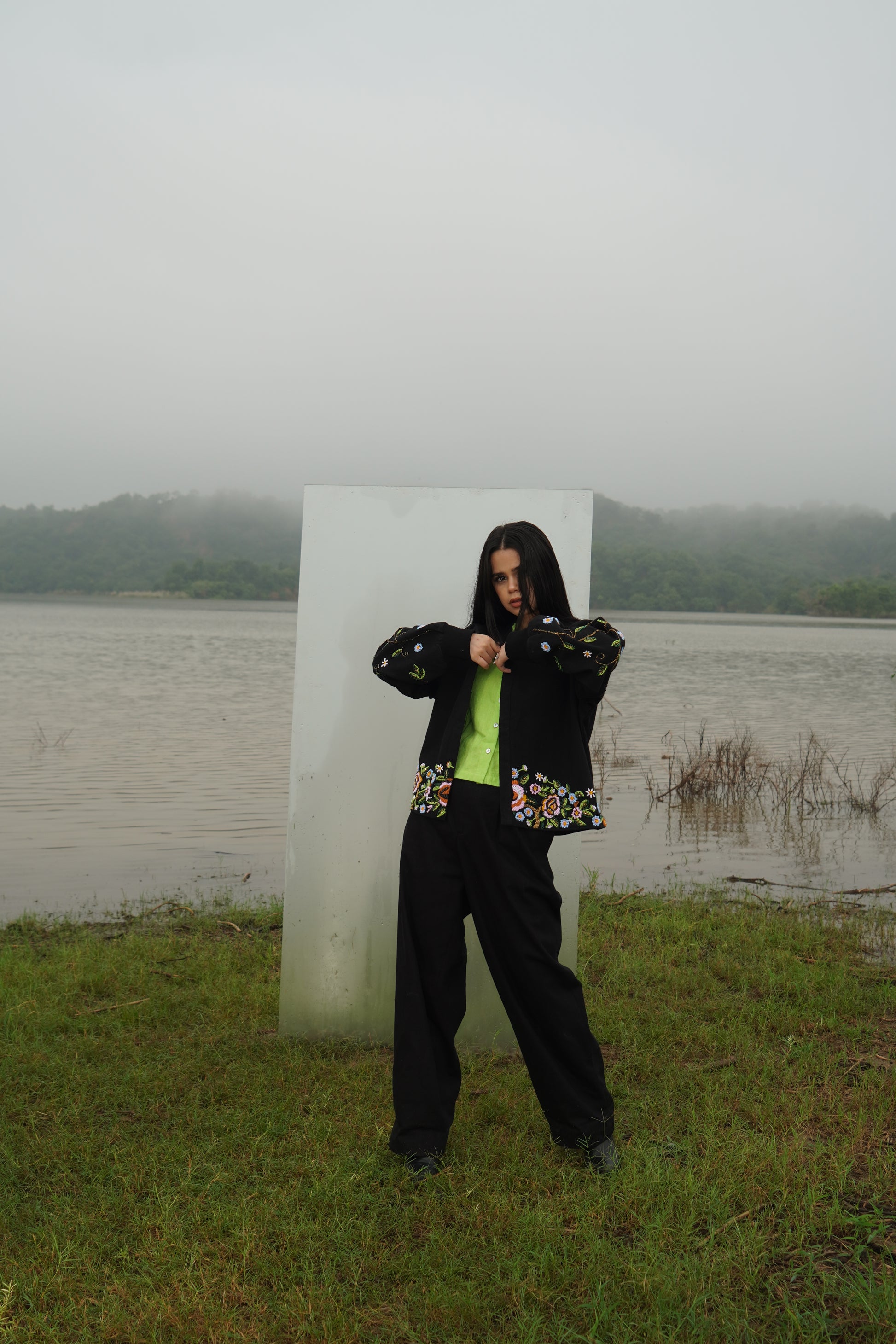 Front view of the beaded Charlie Denim Unisex Jacket Some examples of alt text are “Black 
denim jacket (unisex) has beaded embellishments on sleeves” and “Charlie denim jacket in black 
with intricate bead detailing.”
