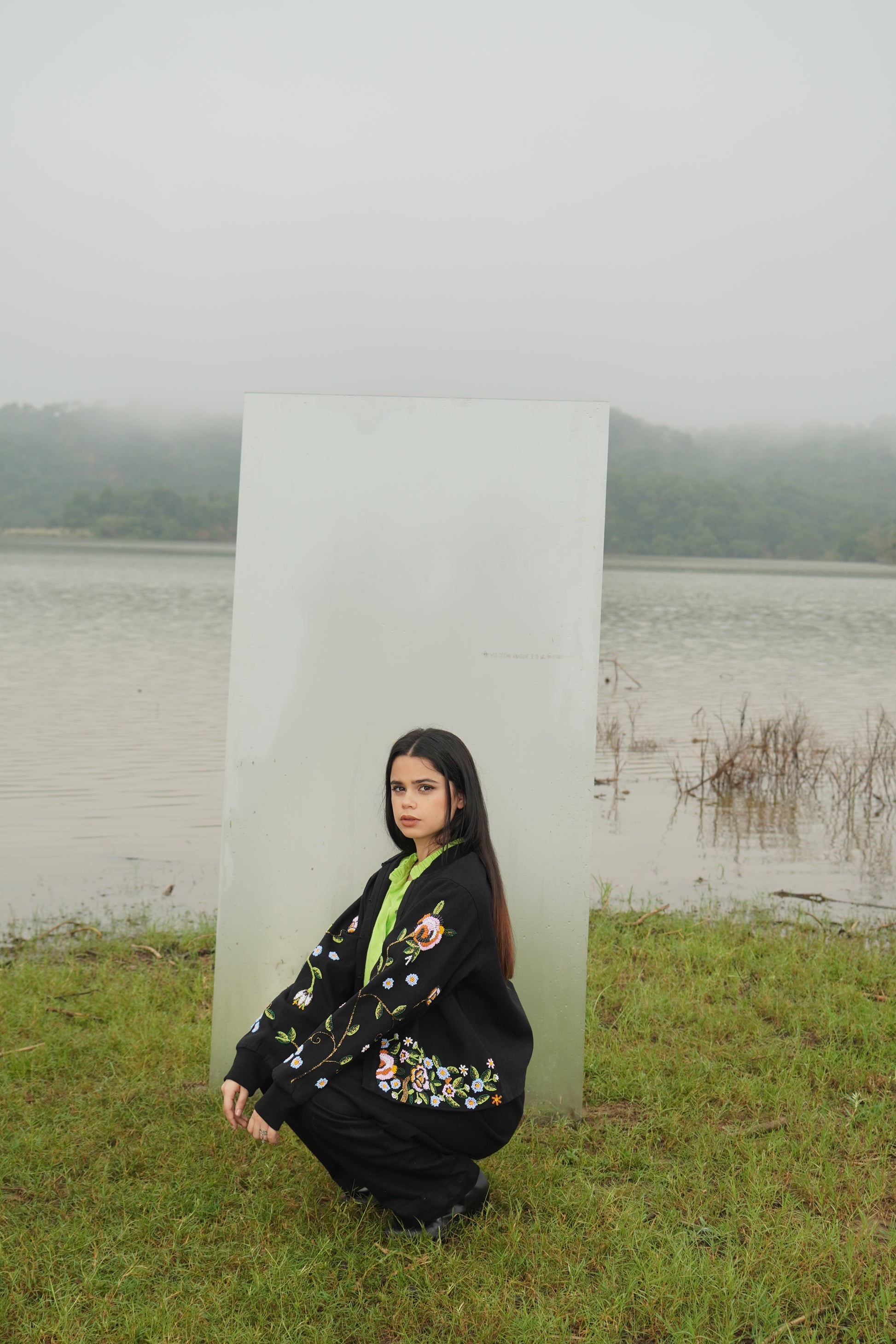 Front view of the beaded Charlie Denim Unisex Jacket Some examples of alt text are “Black 
denim jacket (unisex) has beaded embellishments on sleeves” and “Charlie denim jacket in black 
with intricate bead detailing.”